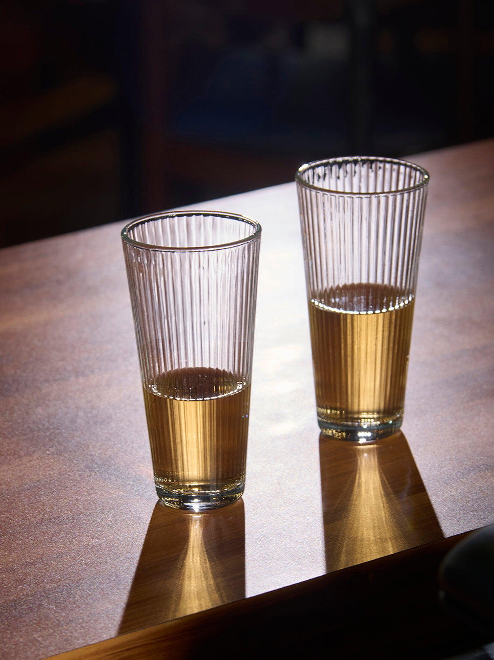 Slim ribbed tall glass drinkware Vertical ribbed tall water glass Clear ribbed tall beverage glass Premium ribbed tall clear glass Textured ribbed tall glass tumbler