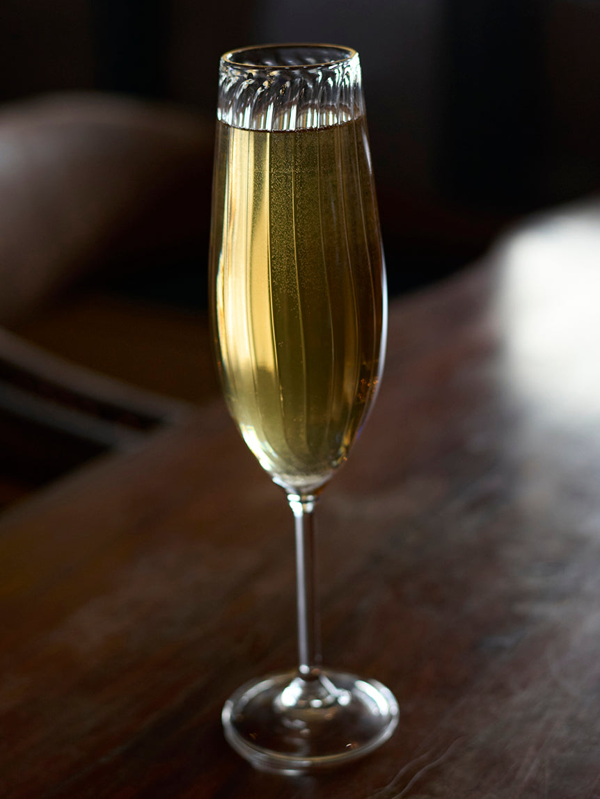 Classic flute glass elegant stemware for champagne Traditional classic flute glass sparkling wine stemware Classic flute glass timeless champagne glassware the glass couture collection