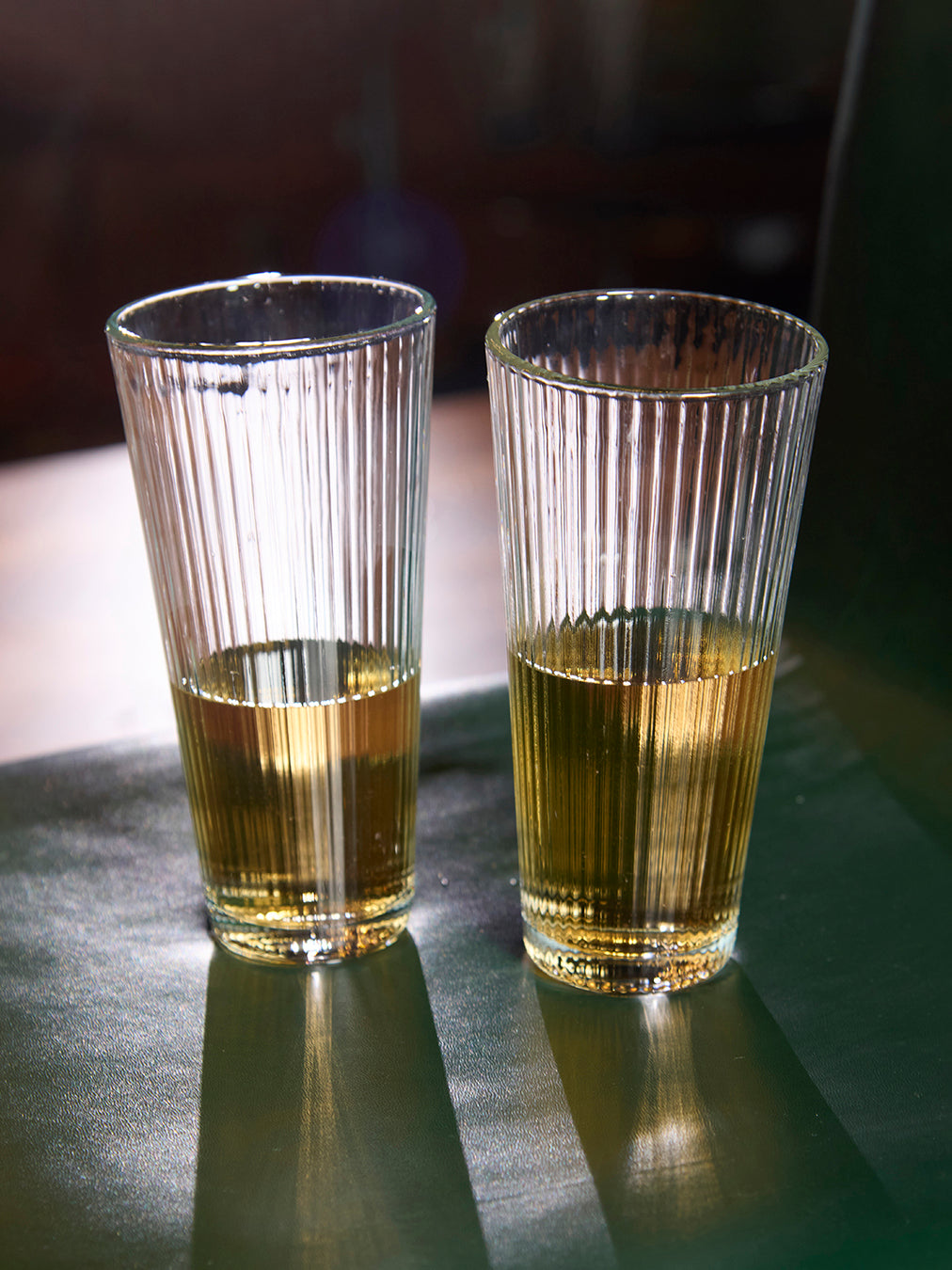 Slim ribbed tall glass drinkware Vertical ribbed tall water glass Clear ribbed tall beverage glass Premium ribbed tall clear glass Textured ribbed tall glass tumbler