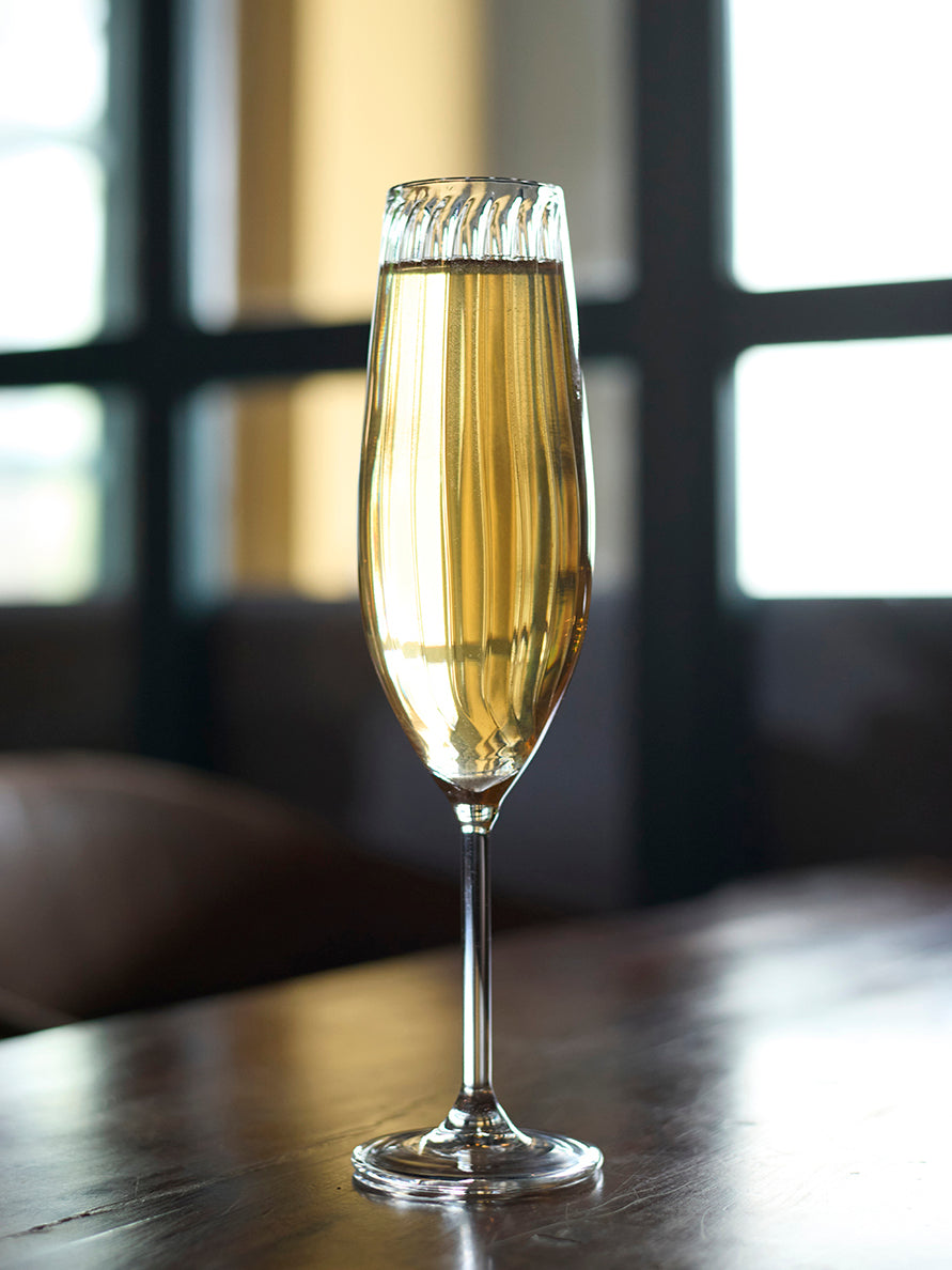 Classic flute glass elegant stemware for champagne Traditional classic flute glass sparkling wine stemware Classic flute glass timeless champagne glassware the glass couture collection