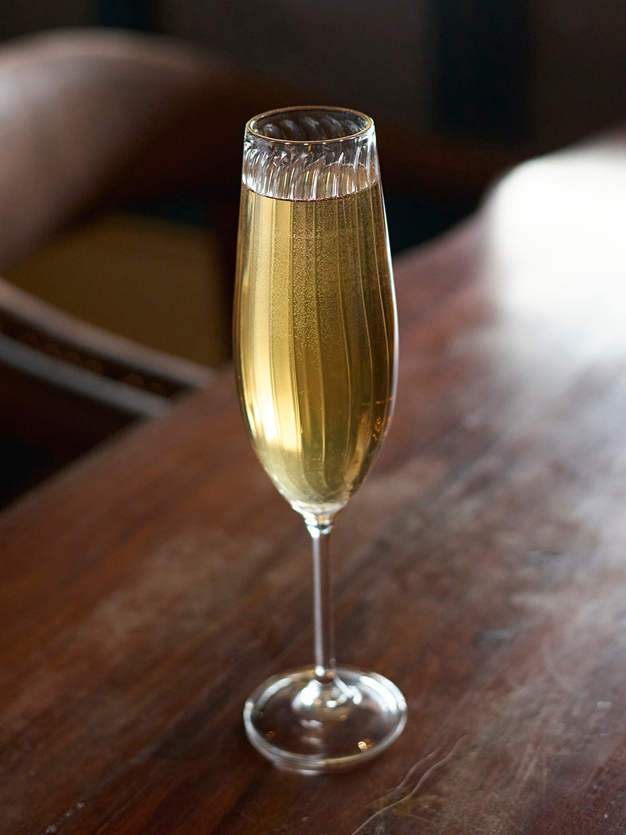 Classic flute glass elegant stemware for champagne Traditional classic flute glass sparkling wine stemware Classic flute glass timeless champagne glassware the glass couture collection