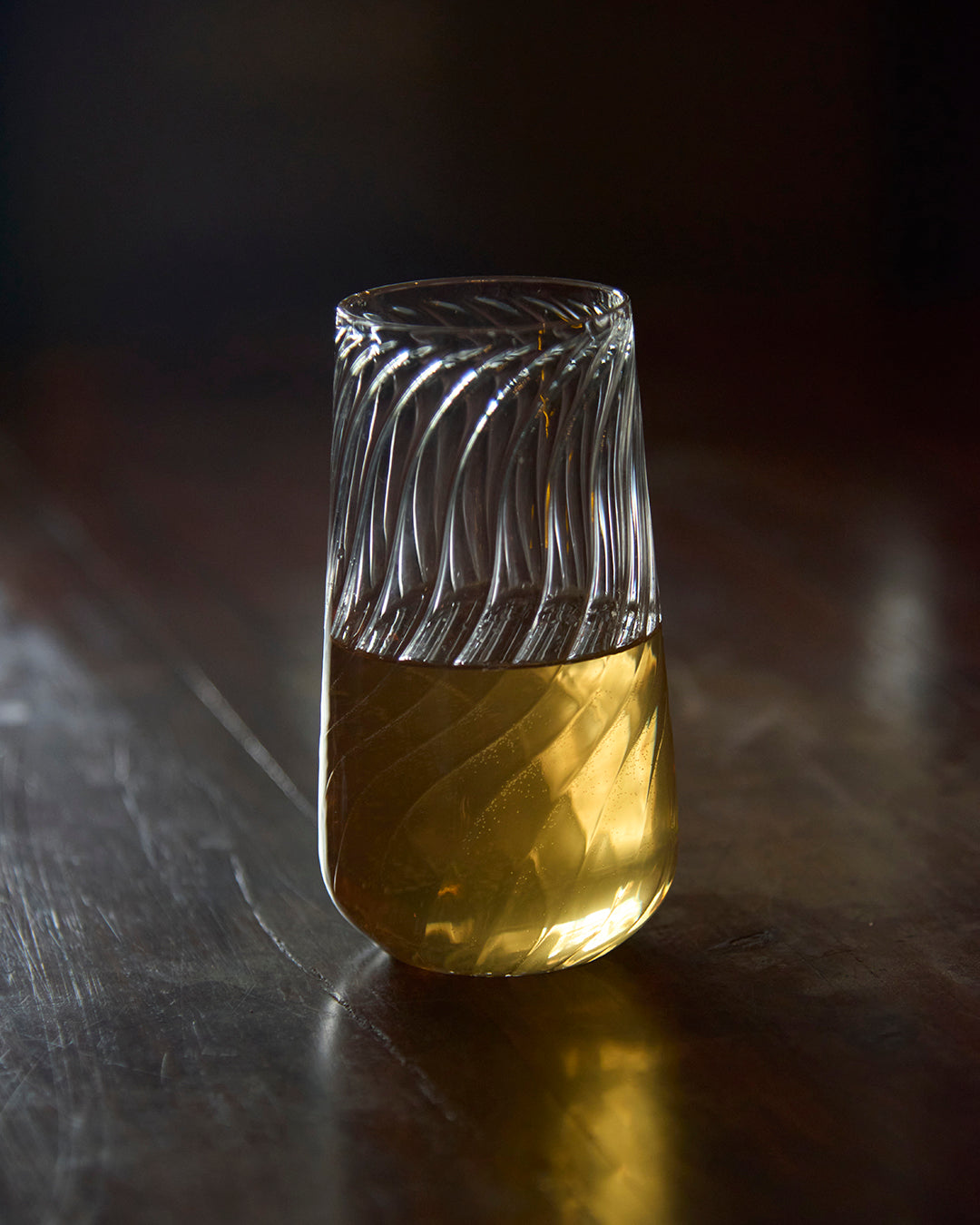 Vivid Sips swirl fluted glass designer drinkware Swirl fluted glass Vivid Sips style modern glassware Swirl fluted glass premium Vivid Sips drinkware the glass couture collection