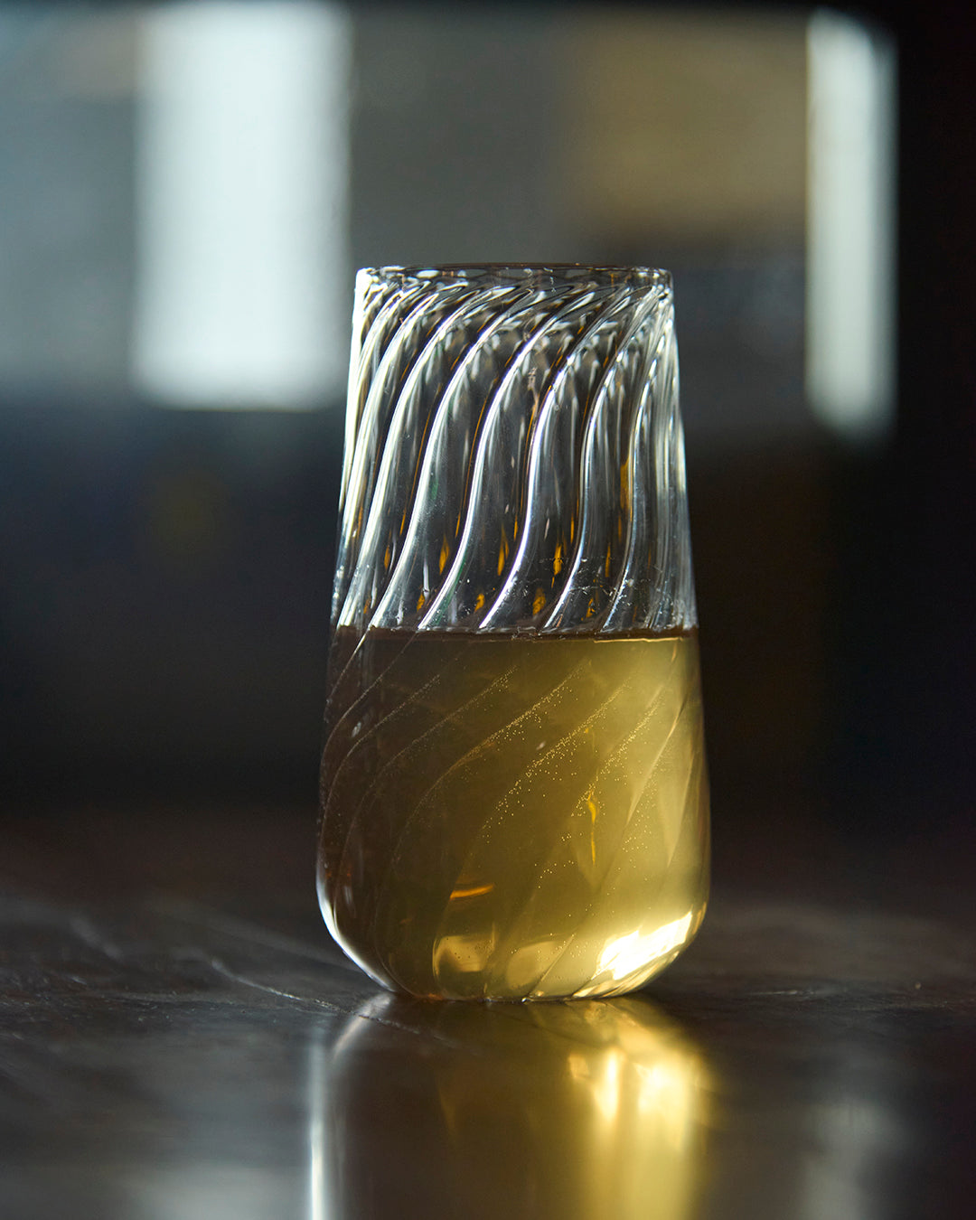 Vivid Sips swirl fluted glass designer drinkware Swirl fluted glass Vivid Sips style modern glassware Swirl fluted glass premium Vivid Sips drinkware the glass couture collection