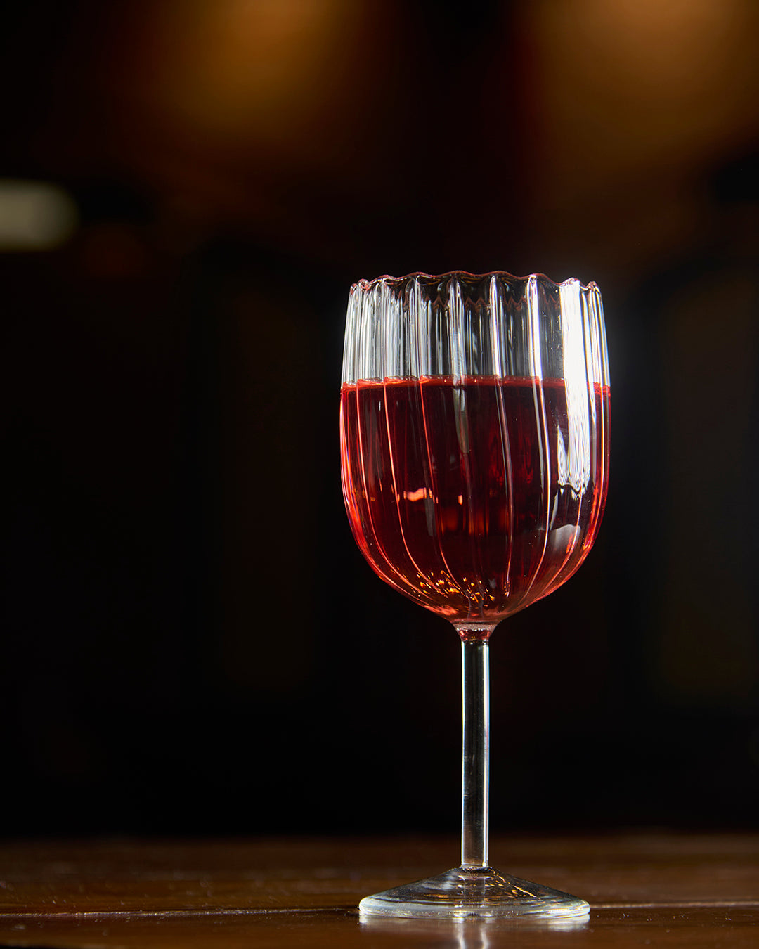 Ribbed pristine fluted wine glass elegant textured clear glassware Wine served in ribbed fluted glass Premium clear glass ribbed fluted wine glass durable stemwarea