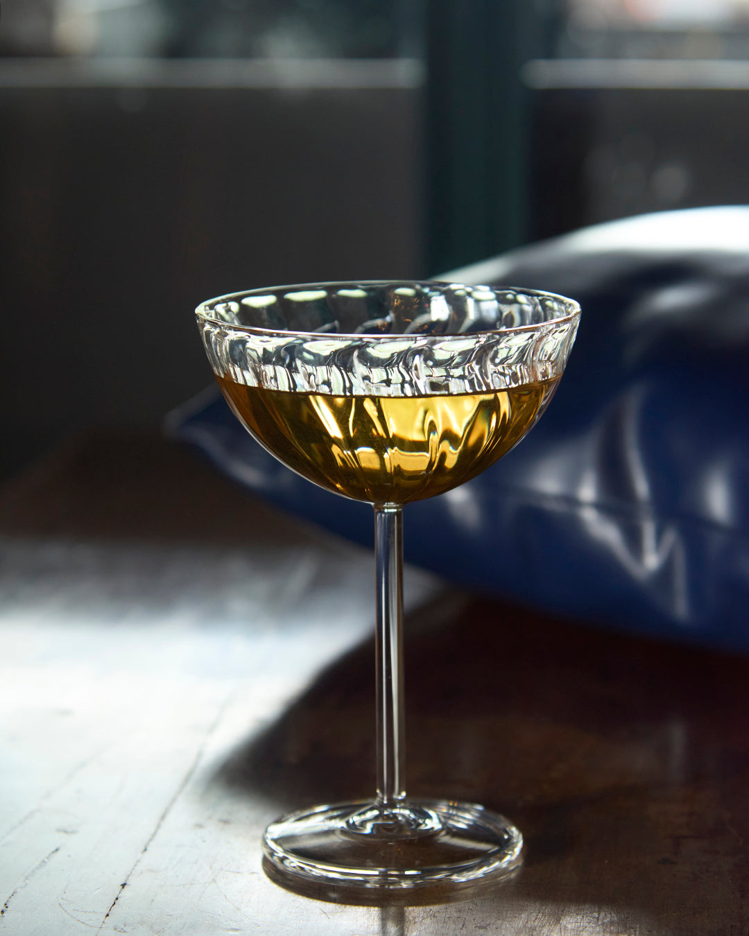 Twist and sip fluted scoop glass with twisted ribbed design clear glassware Dessert served in twisted fluted scoop glass Premium clear glass fluted scoop with twisted rib texture