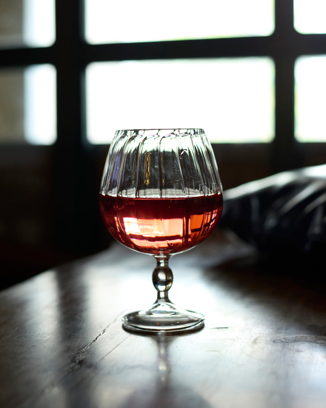 Royal chalice fluted goblet glass elegant ribbed clear glassware Wine served in royal fluted goblet glass High clarity ribbed goblet glass durable tableware