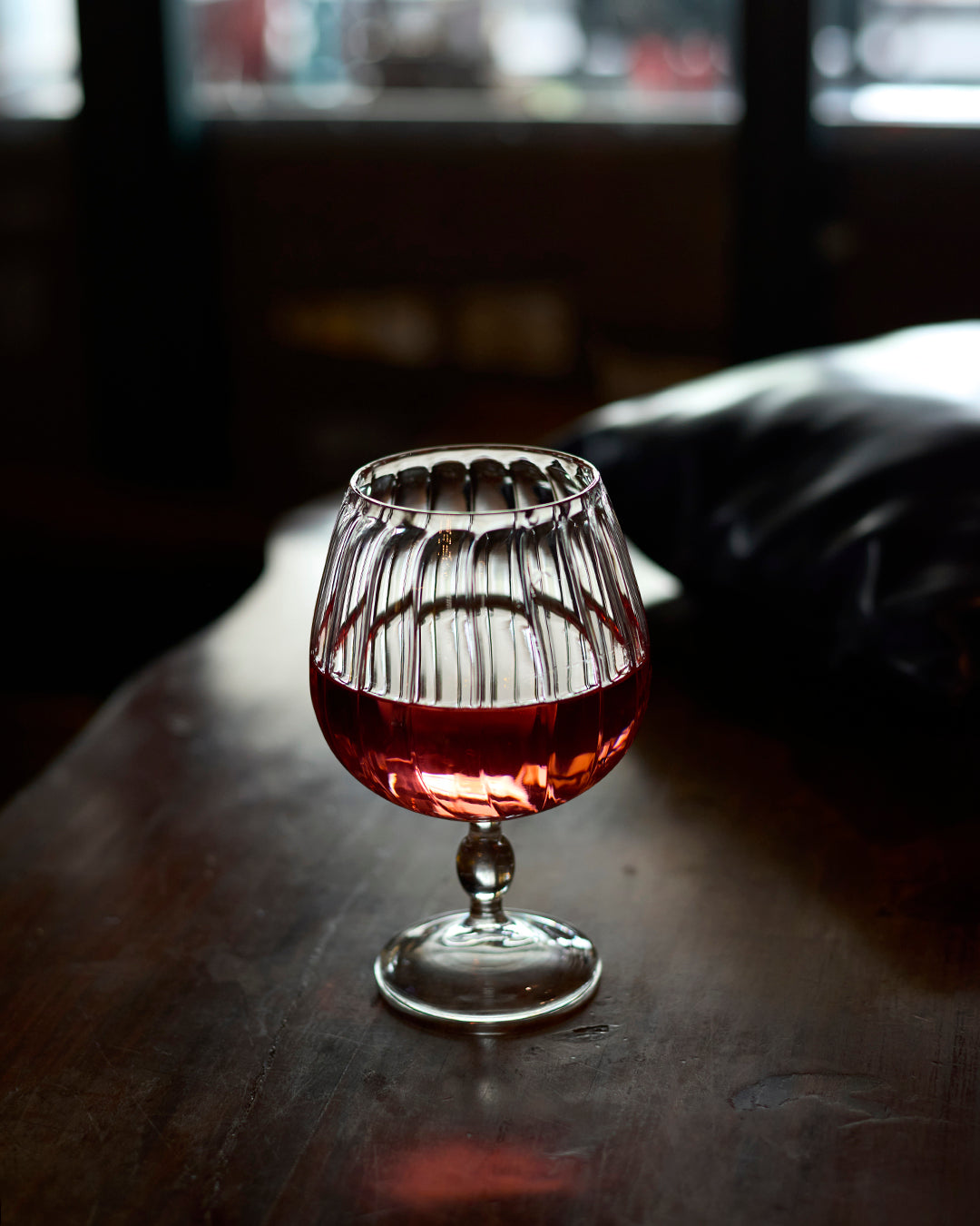 Royal chalice fluted goblet glass elegant ribbed clear glassware Wine served in royal fluted goblet glass High clarity ribbed goblet glass durable tableware