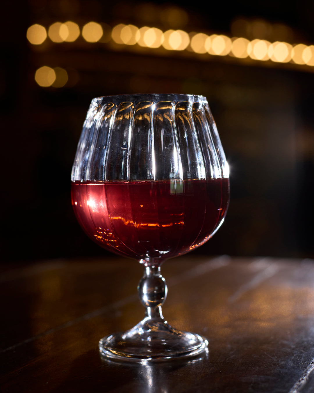 Royal chalice fluted goblet glass elegant ribbed clear glassware Wine served in royal fluted goblet glass High clarity ribbed goblet glass durable tableware