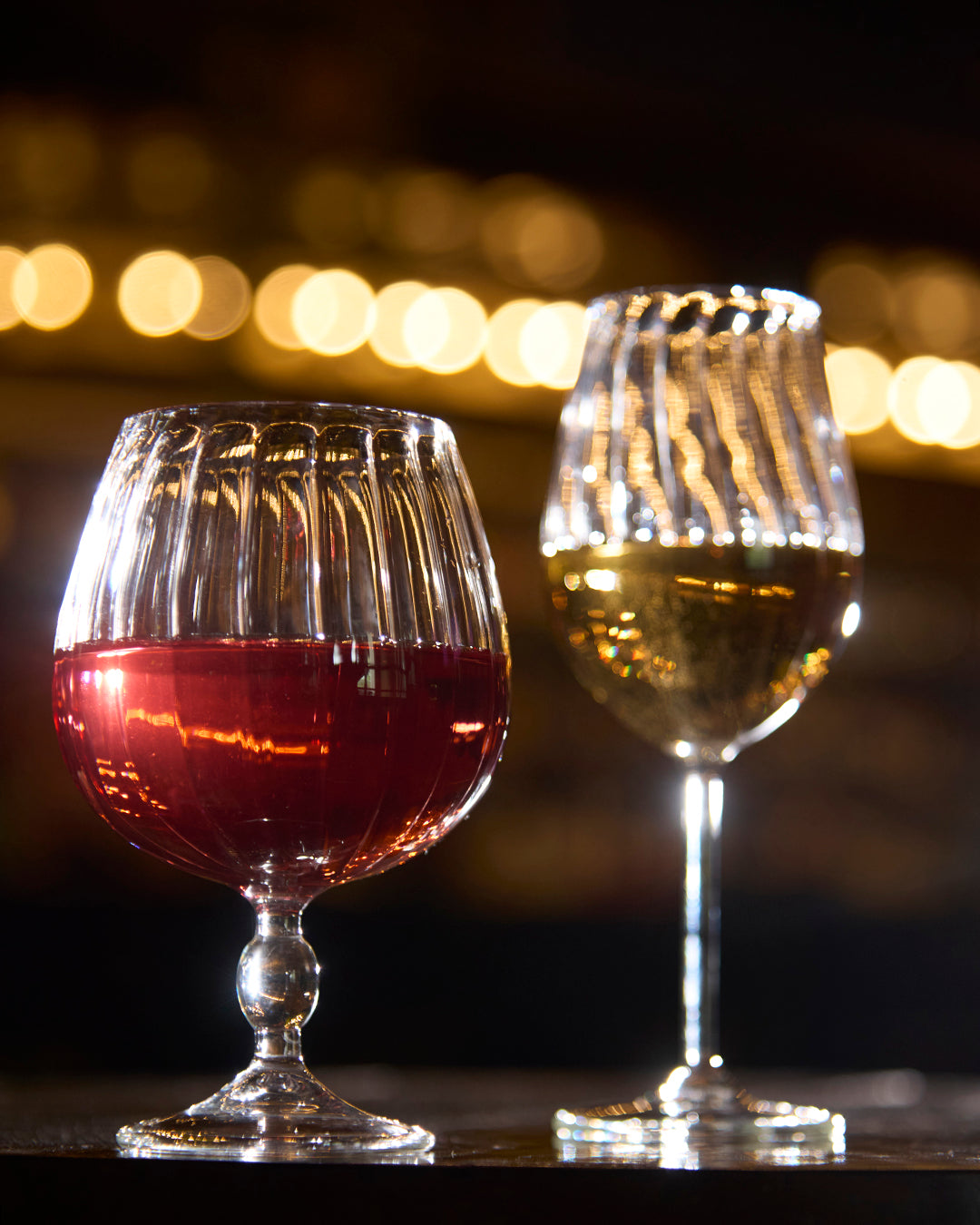 Royal chalice fluted goblet glass elegant ribbed clear glassware Wine served in royal fluted goblet glass High clarity ribbed goblet glass durable tableware