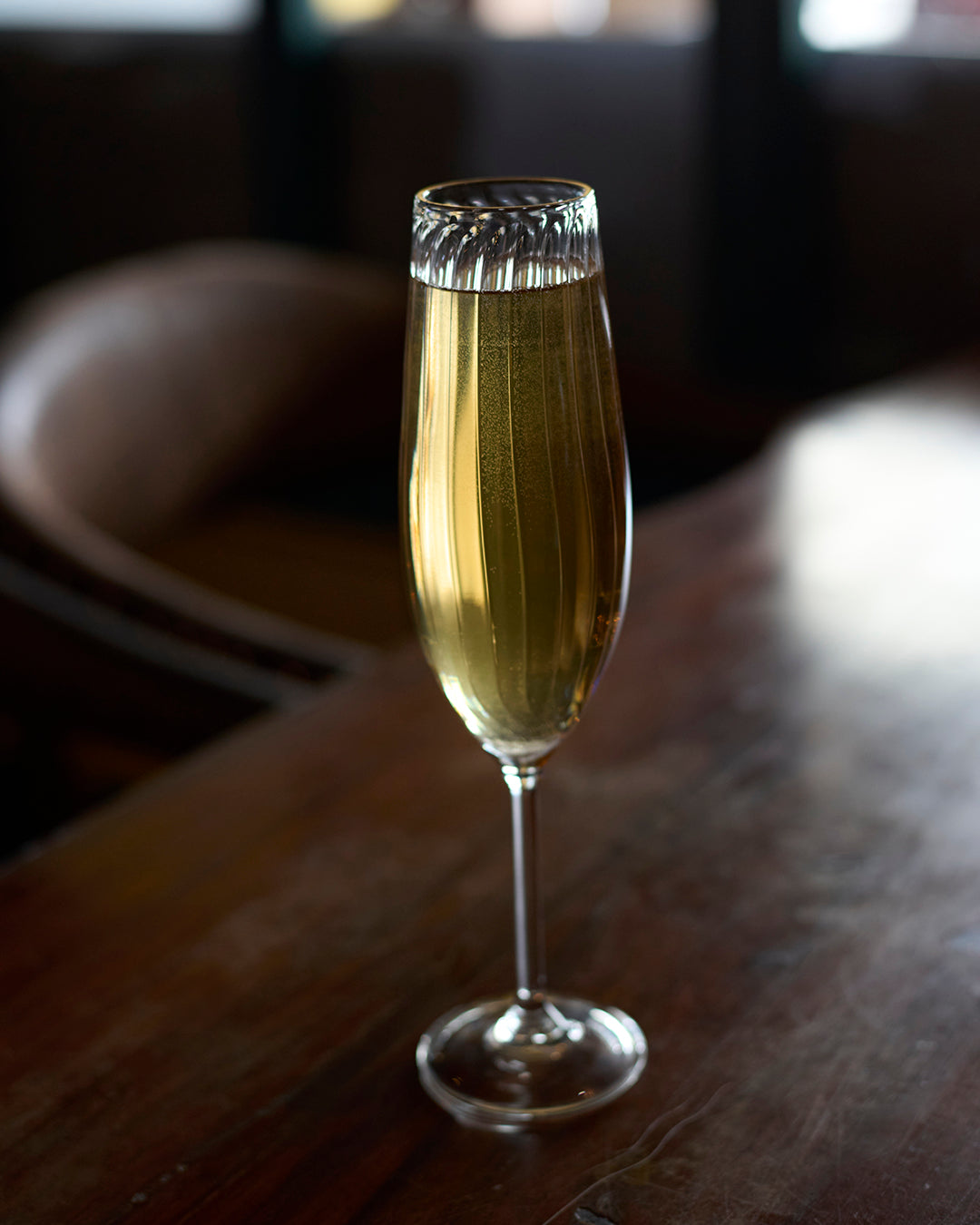 Classic flute glass for champagne prosecco and sparkling wine Champagne served in classic clear flute glass Tall stem classic flute glass with narrow bowl design Classic champagne flute glass