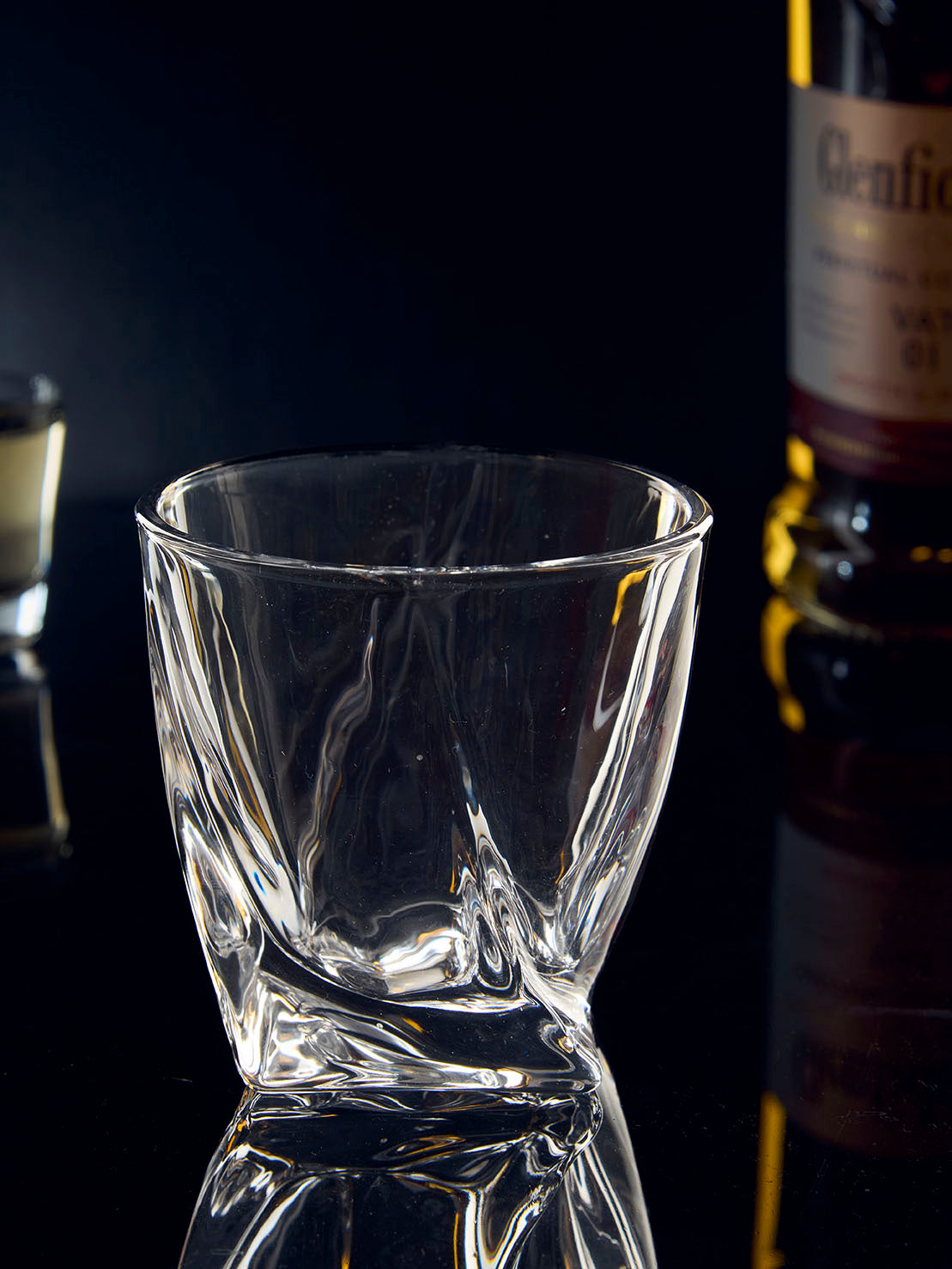 Twisted Elegance glass drinkware clear twisted glass Twisted Elegance textured glass cup Twisted Elegance spiral pattern glass Twisted Elegance decorative glass tumbler