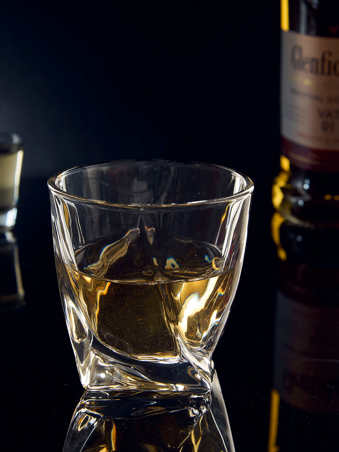 Twisted Elegance glass drinkware clear twisted glass Twisted Elegance textured glass cup Twisted Elegance spiral pattern glass Twisted Elegance decorative glass tumbler